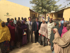 Paul meeting local villagers during his trade visits